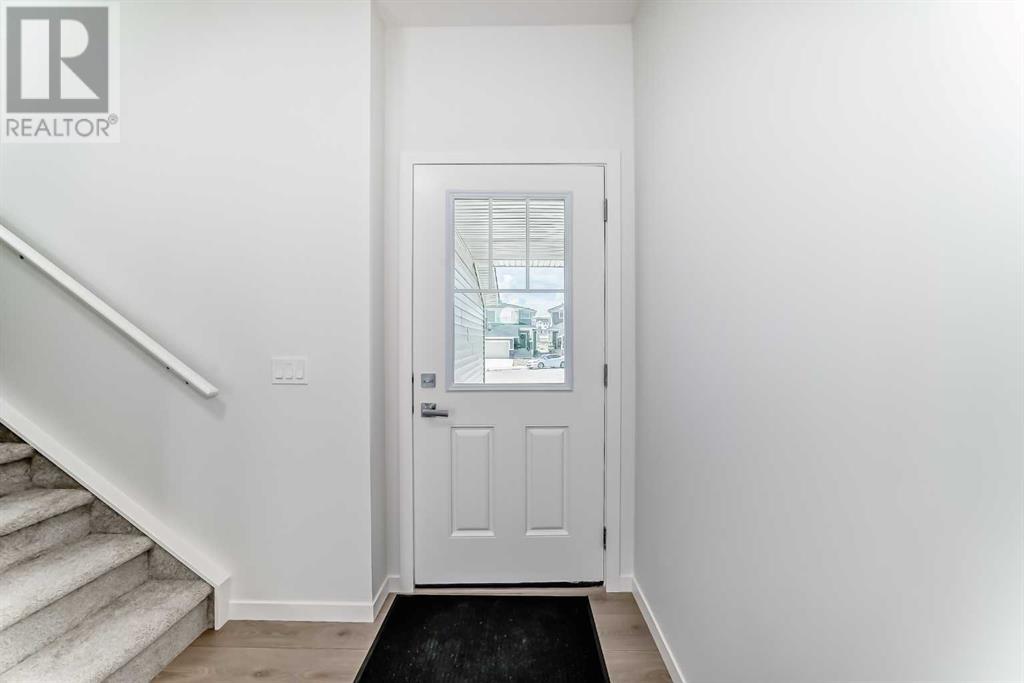 934 Bayview Heights Sw, Airdrie, Alberta  T4B 5M6 - Photo 4 - A2236726