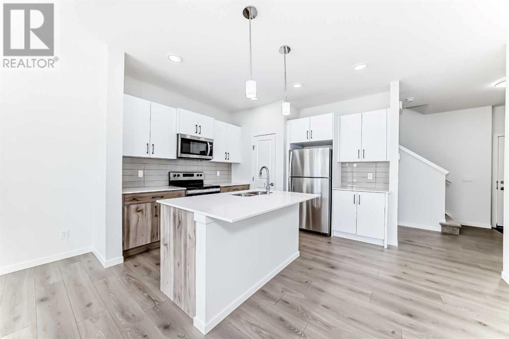 934 Bayview Heights Sw, Airdrie, Alberta  T4B 5M6 - Photo 8 - A2236726