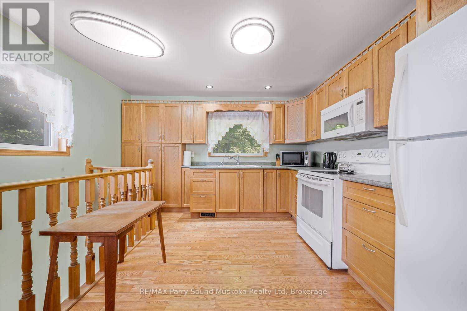 124 Pinewood Road, Mcdougall, Ontario  P2A 2W9 - Photo 20 - X12316640