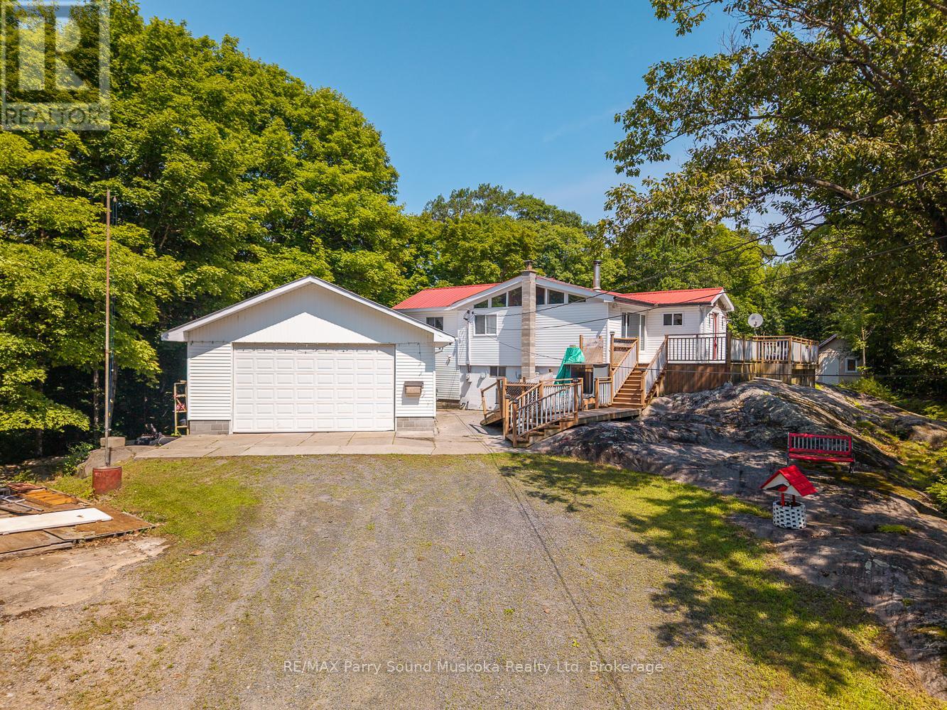 124 Pinewood Road, Mcdougall, Ontario  P2A 2W9 - Photo 3 - X12316640