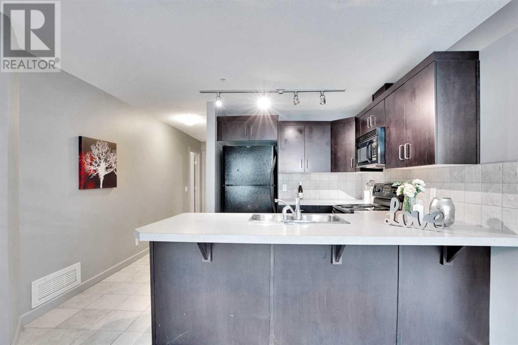210, 1410 1 Street Se, Calgary, Alberta  T2G 5T7 - Photo 9 - A2155653