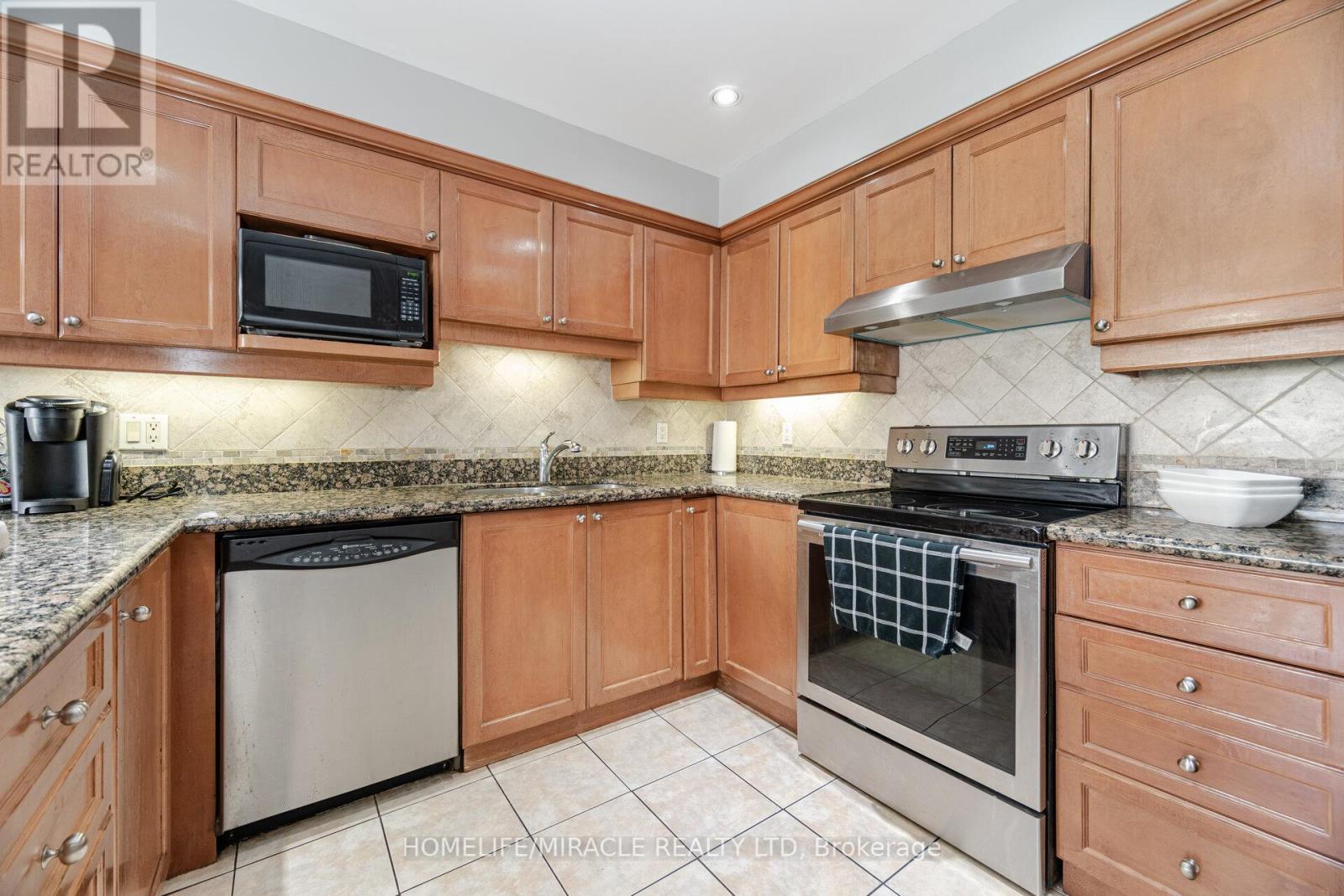 32 - 83 Mondeo Drive, Toronto, Ontario  M1P 5B6 - Photo 13 - E12318523