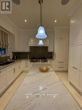 79 Annsleywood Court, Vaughan, Ontario  L4H 4G6 - Photo 7 - N12318803