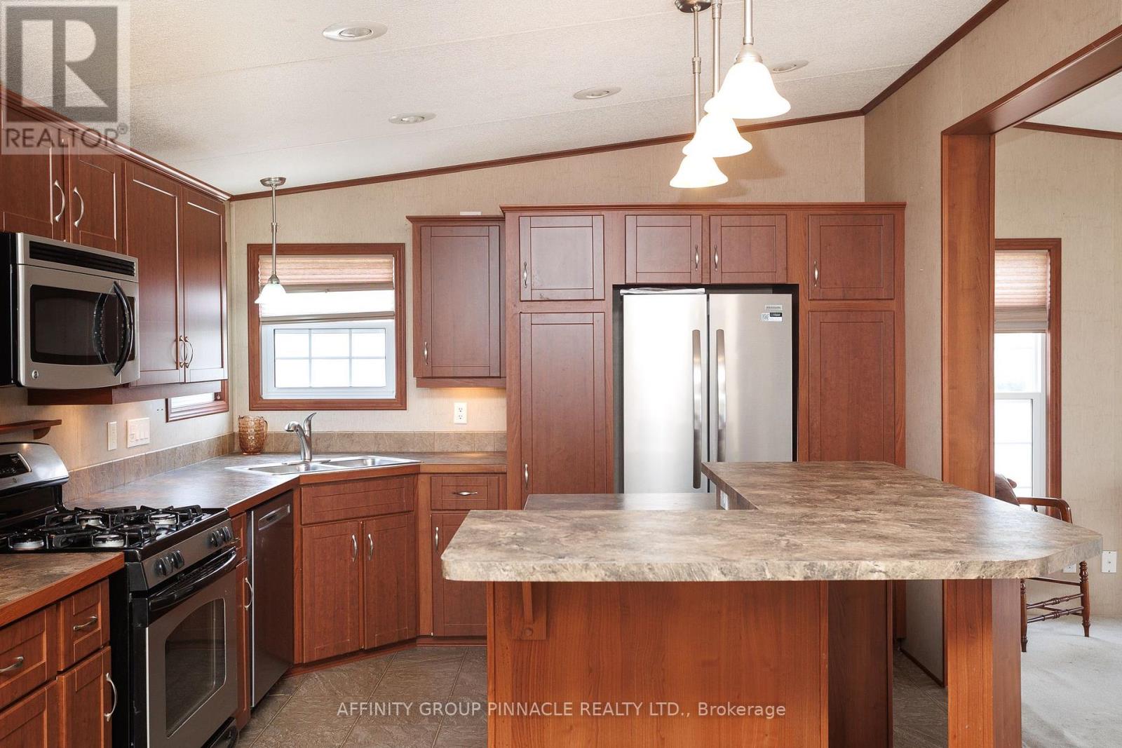 20 Creekside Circle, Kawartha Lakes, Ontario K0M 1L0 - Photo 17 - X12319073