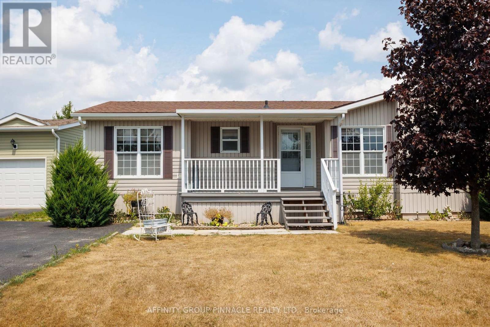 20 Creekside Circle, Kawartha Lakes, Ontario K0M 1L0 - Photo 3 - X12319073