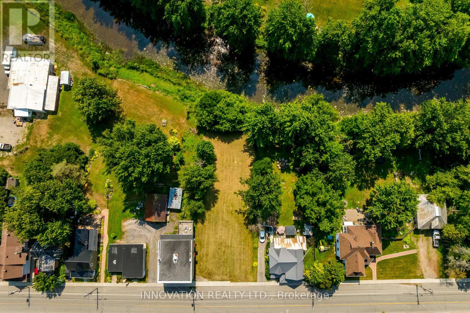 Discover the perfect place to create your dream home in the picturesque country village of Mountain. This beautiful building lot backs directly onto the tranquil South Nation River, offering a serene backdrop and endless opportunities to enjoy nature right in your backyard. Located in a welcoming community, this property is just minutes from the local school and a nearby golf course, making it ideal for families and outdoor enthusiasts alike. With its peaceful setting and convenient access to amenities, this lot provides the best of both worlds  country charm and everyday convenience Don't miss your chance to build the home you've always envisioned on this stunning riverside property! Slope stability assessment, Survey, Septic plan and more available. (id:48254)