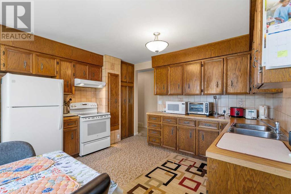 2140 Halifax Crescent Nw, Calgary, Alberta  T2M 4C7 - Photo 19 - A2244819