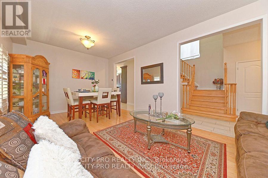 7302 Rosehurst Drive, Mississauga, Ontario  L5N 8H1 - Photo 5 - W12319834