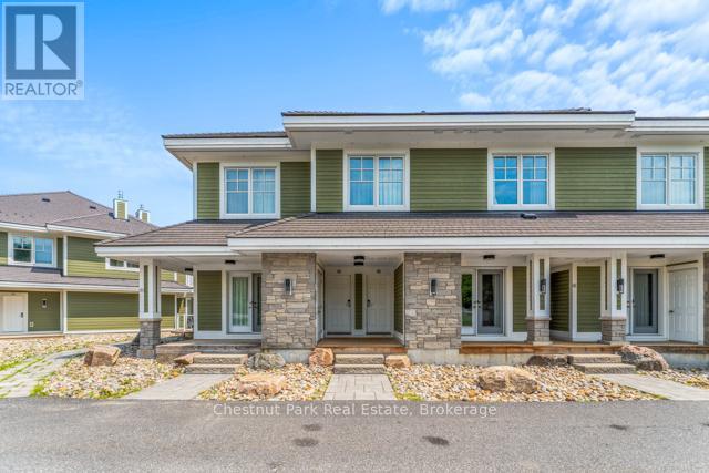 B206 - 1869 Muskoka Road 118 Road W, Muskoka Lakes, Ontario  P1L 1W8 - Photo 2 - X12320248