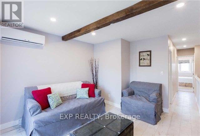 Upper - 122 Parkmount Road, Toronto, Ontario  M4J 4V4 - Photo 12 - E12113596