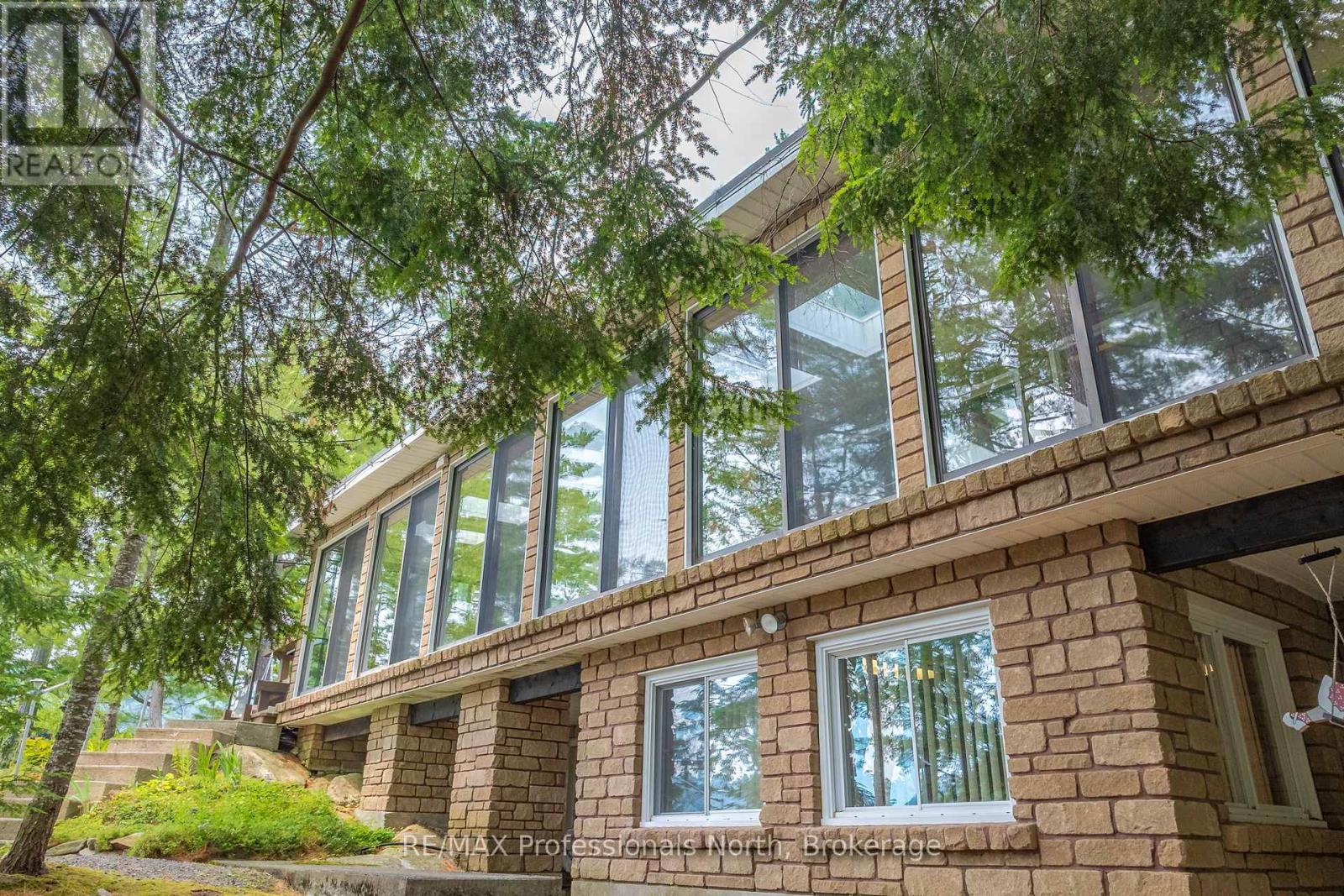 1077 Precambrian Drive N, Algonquin Highlands, Ontario  P0A 1E0 - Photo 3 - X12321412