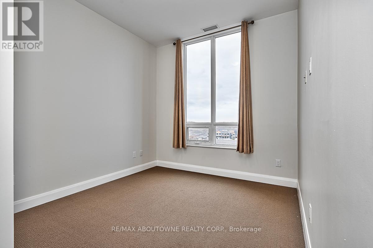 714 - 2480 Prince Michael Drive, Oakville (Jc Joshua Creek), Ontario  L6H 0H1 - Photo 12 - W12322092