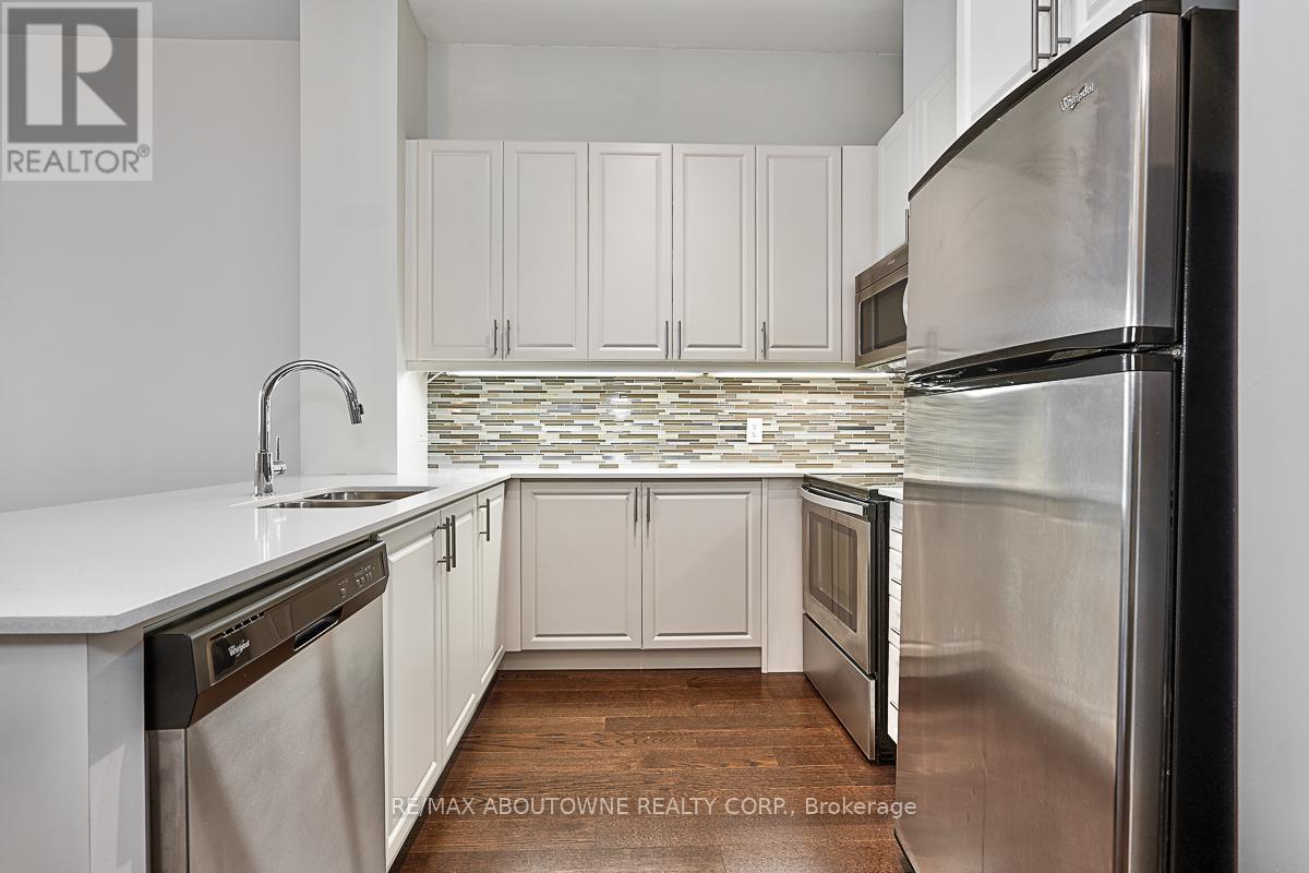 714 - 2480 Prince Michael Drive, Oakville, Ontario  L6H 0H1 - Photo 6 - W12322092