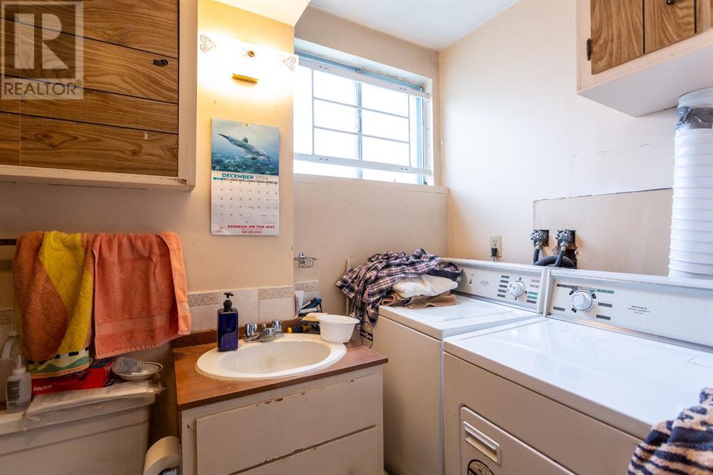 7803 Hunterslea Crescent Nw, Calgary, Alberta  T2K 4M3 - Photo 11 - A2239554
