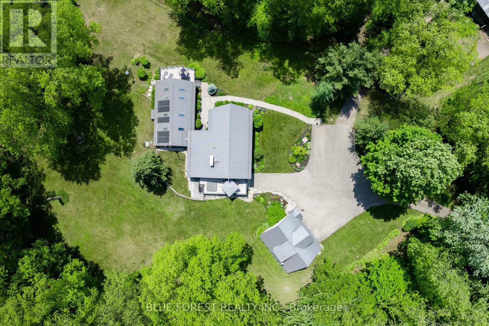 5721 Marion Street Thames Centre, Ontario Dream Home check list - over 20 acres of land, beautifully landscaped yards, long winding drive, indoor pool, hot tub, detached and oversized garage with upper apartment, stunning 3 bedroom, 3 bath home, incredible views of forest and wildlife, 1.5 kms of groomed trails, large pond, outbuildings with old town facades and includes a huge party room, shops, car bays and even a mezzanine, its all right here to make your dreams come true. Properties like this don't come along often, it is Zoned Agricultural with managed forest designation and taxes of just over $4000 yearly. Nestled on the outskirts of Dorchester, mere minutes to the 401 and a short drive to both London and Woodstock. The house has been very well maintained throughout and boasts a long list of updates, (Furnace, AC, Plumbing ) upgrades, (such as the new Panels and Breakers in 2023) and renovations as you will see in the photos, virtual tour and video. There is just too much to describe in this brief space, so do yourself a favor and book a private showing today and prepare to be impressed. Over 3500 square feet of living space and an additional 3500 square feet of shops, mancave, and games room. (id:48254)