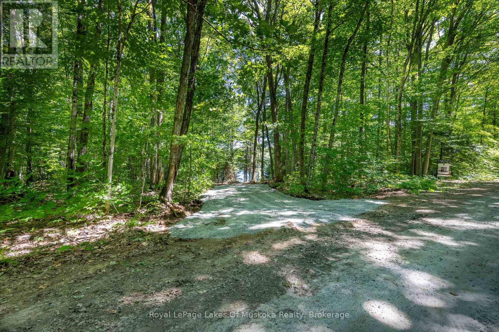 437 Otter Lake Road, Huntsville, Ontario  P1H 2J3 - Photo 3 - X12229071
