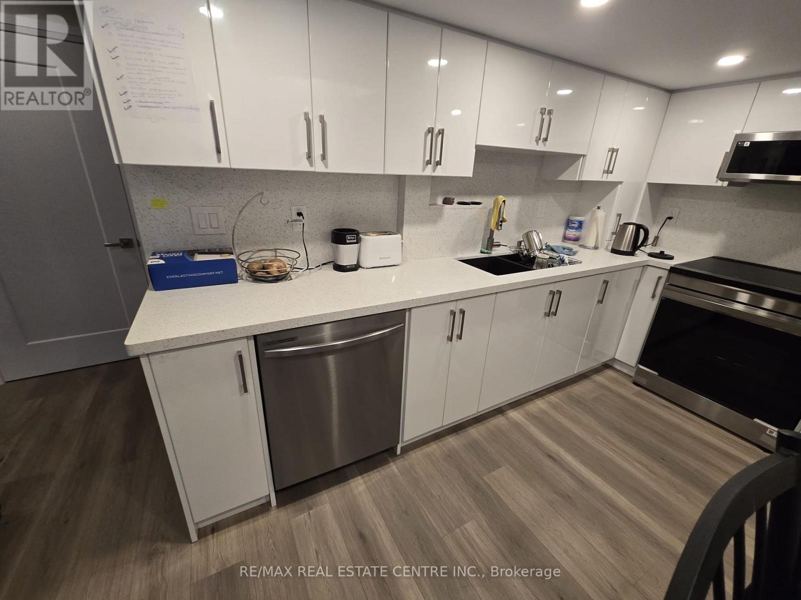 Bsmt. - 1412 Rose Way, Milton, Ontario  L9T 7E7 - Photo 19 - W12322965