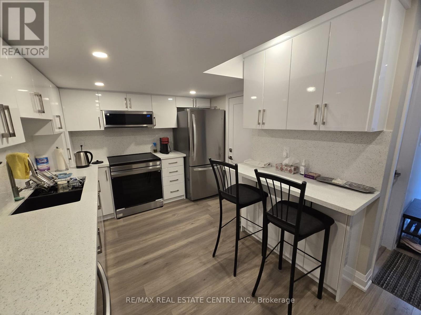 Bsmt. - 1412 Rose Way, Milton, Ontario  L9T 7E7 - Photo 21 - W12322965