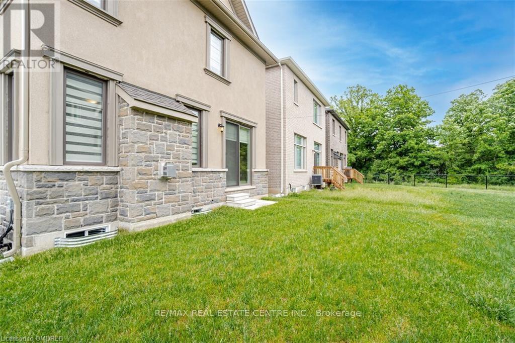Bsmt. - 1412 Rose Way, Milton, Ontario  L9T 7E7 - Photo 37 - W12322965