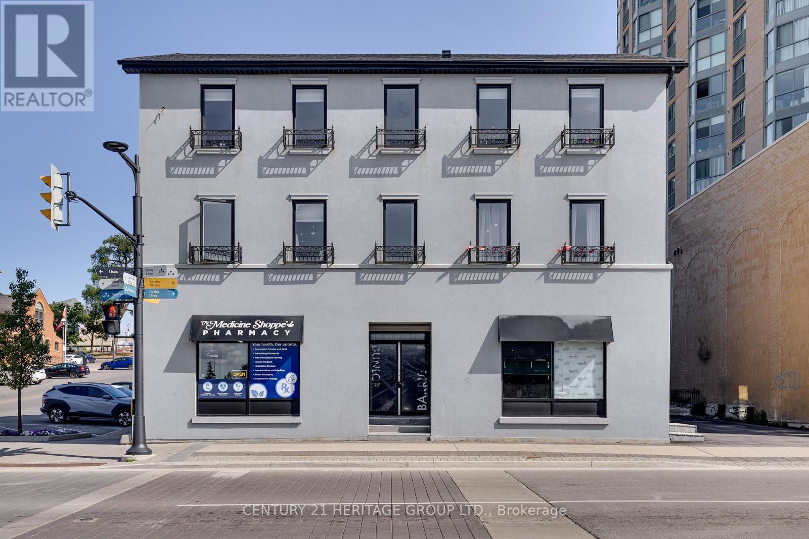 102 - 130 Dunlop Street E, Barrie, Ontario  L4M 1B1 - Photo 1 - S12323070