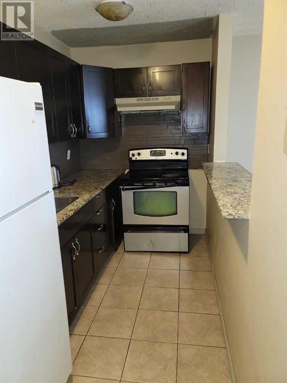 Property at 209, 1712 38 Street SE image 3