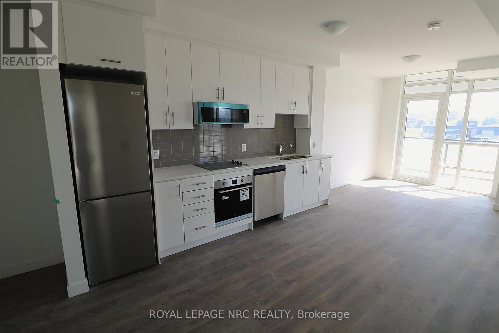 223 - 461 Green Road, Hamilton (Stoney Creek), Ontario  L8E 5B4 - Photo 1 - X12323558