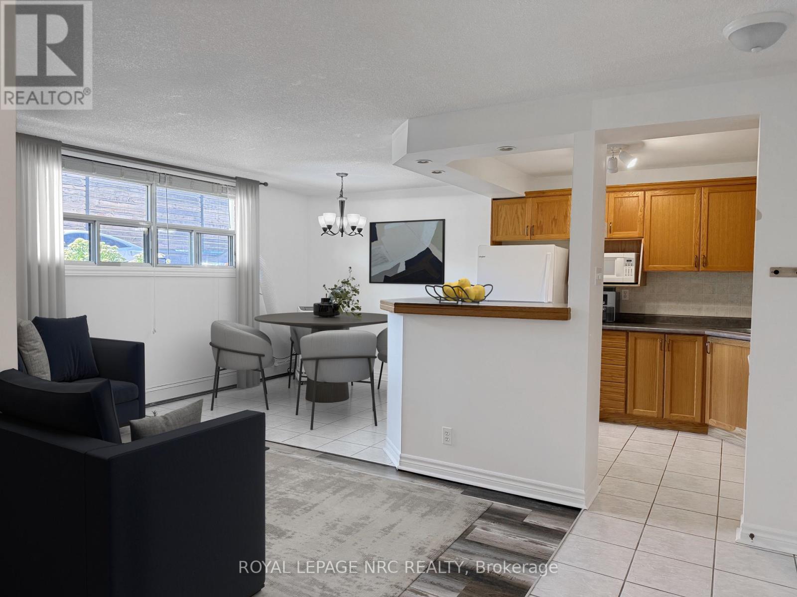 103 - 264 Oakdale Avenue, St. Catharines, Ontario  L2P 2K4 - Photo 2 - X12311142