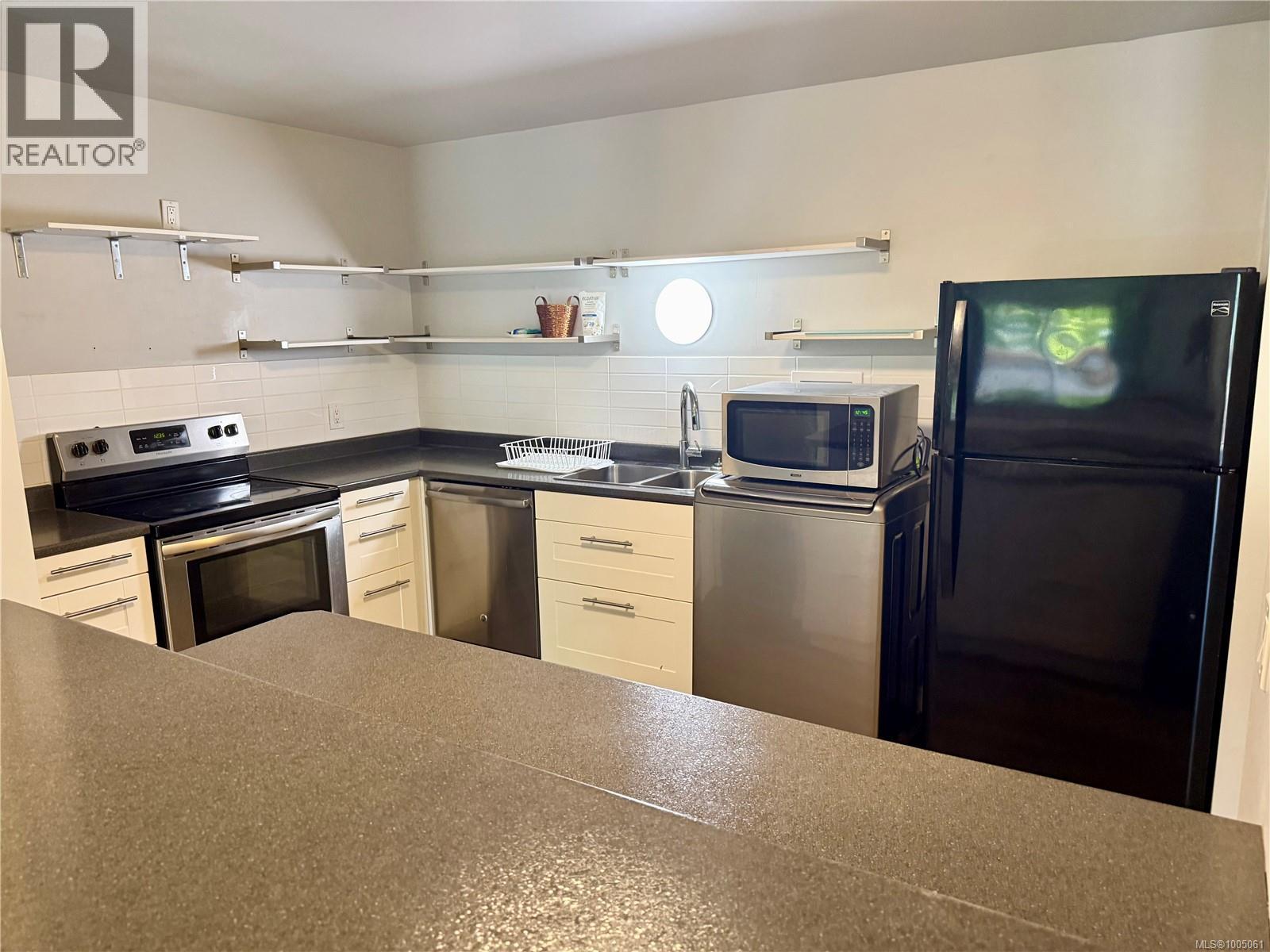 Property at 207 4728 Uplands Dr image 3