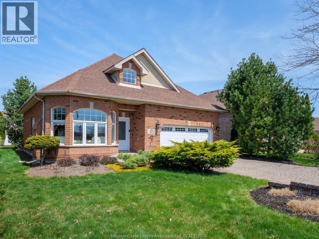 Experience refined living in this elegant 1.5-storey full brick residence, perfectly situated in prestigious Southwood Lake, an upscale family oriented community in South Windsor with serene lake views and tranquil surroundings. Directly across from Wolfe Lake Park, this home offers effortless access to premium amenities, trails, and top-rated schools. Step inside to a beautifully appointed open-concept layout featuring a custom oak fireplace, rich oak kitchen cabinetry, quartz countertops. The spacious main-floor primary suite provides a relaxing retreat, while two additional bedrooms, three stylish bathrooms, finished basement and plenty of storage cater to comfort and convenience. This home offers high-efficiency HVAC systems, tankless water heater, and a whole-home dehumidifier. Custom paint, an epoxy-finished garage, nice landscaping and inground sprinkler system. Call today for your private viewing. (id:48254)