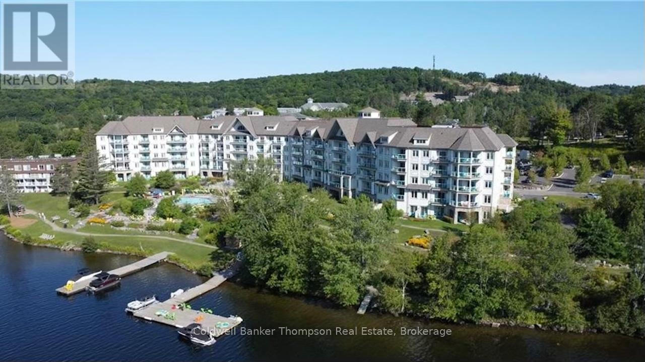 110 - 25 Pen Lake Point Road, Huntsville, Ontario  P1H 1A9 - Photo 2 - X12327221