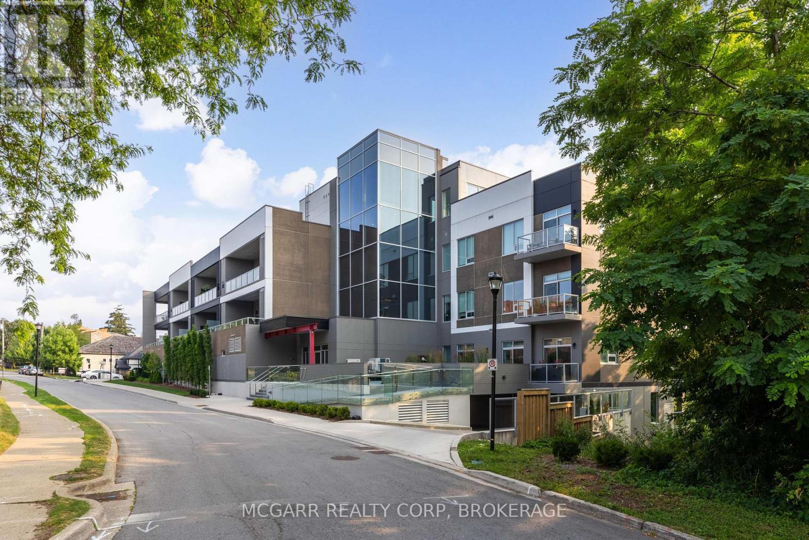 203 - 77 Yates Street, St. Catharines, Ontario  L2R 5R7 - Photo 1 - X12327758