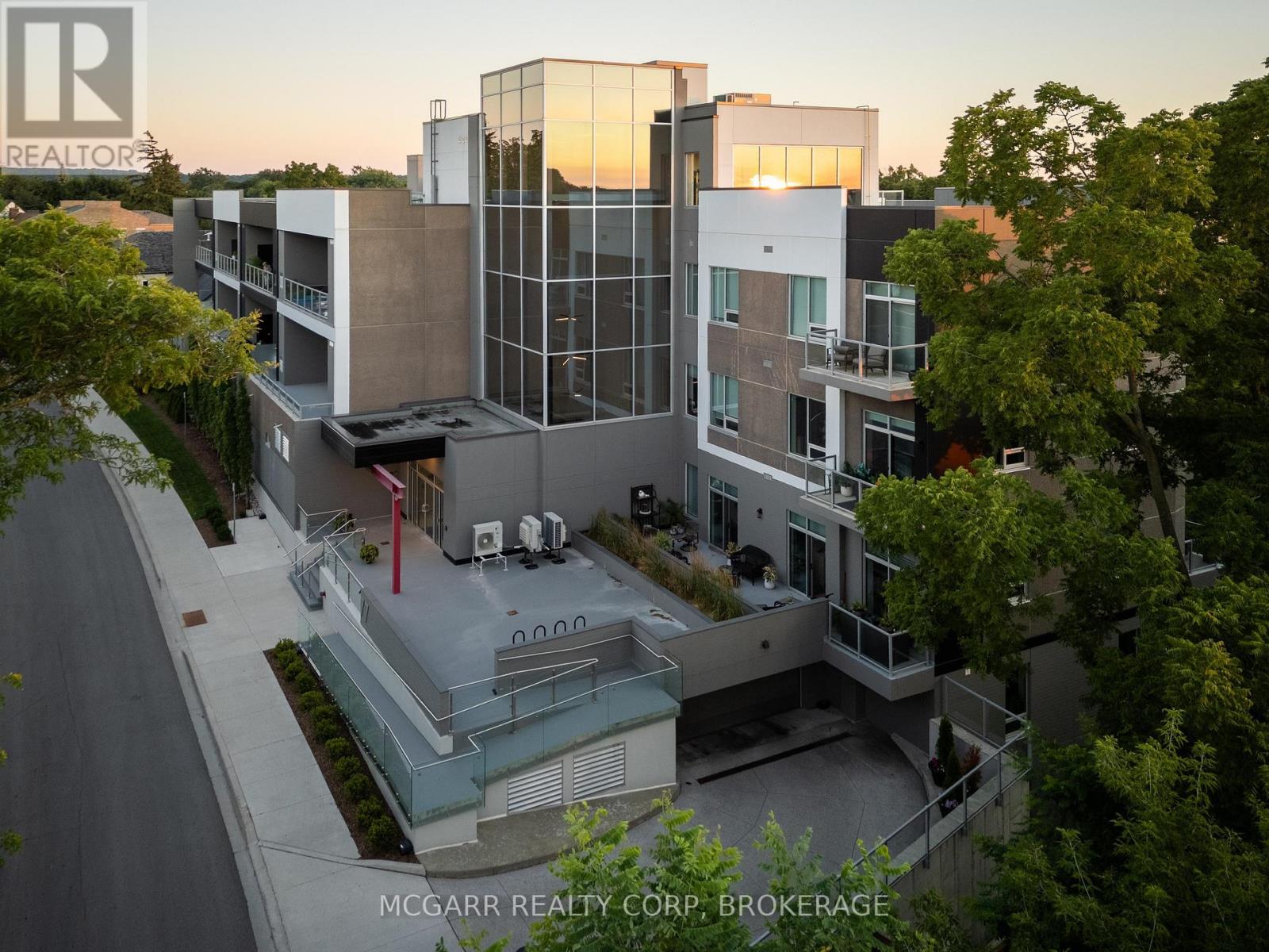 203 - 77 Yates Street, St. Catharines, Ontario  L2R 5R7 - Photo 2 - X12327758