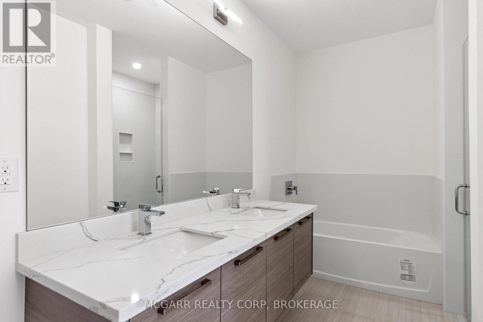 203 - 77 Yates Street, St. Catharines, Ontario  L2R 5R7 - Photo 33 - X12327758