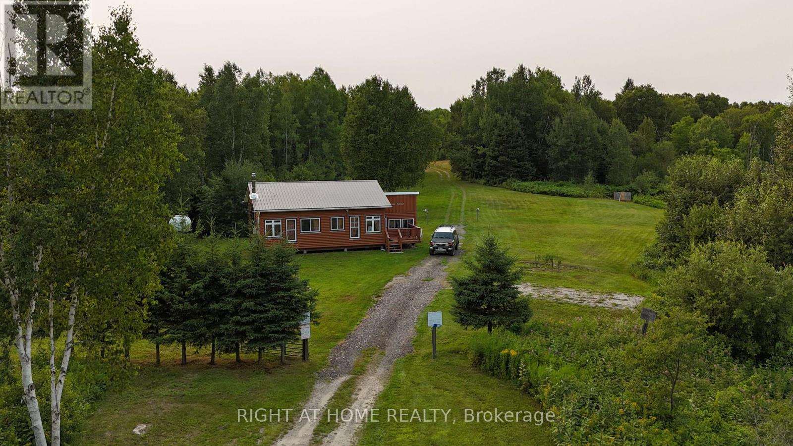 191 Ashburton Road, West Nipissing (Field), Ontario  P0H 1M0 - Photo 3 - X12327688