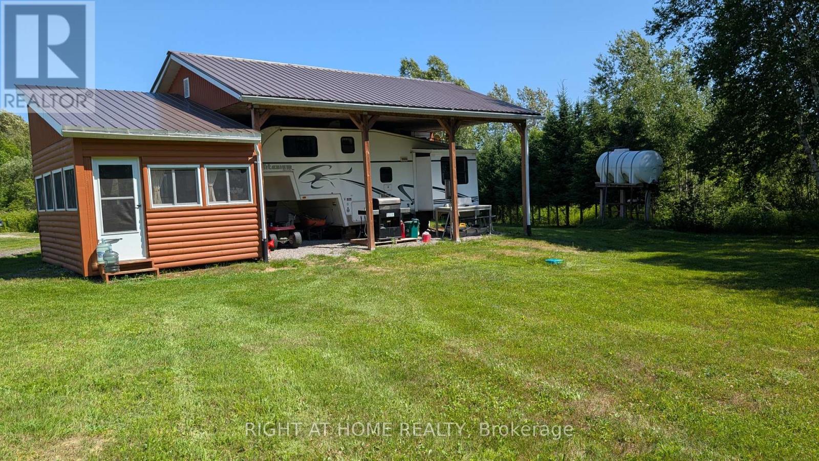 191 Ashburton Road, West Nipissing (Field), Ontario  P0H 1M0 - Photo 4 - X12327688