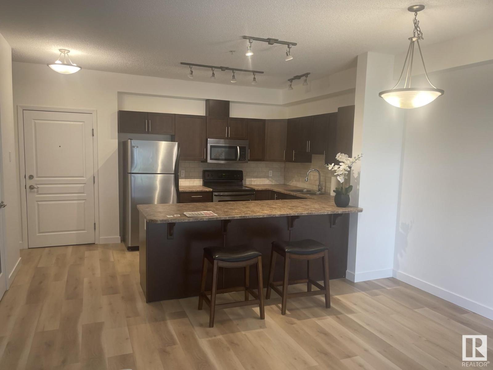 Property at #105 2035 GRANTHAM COURT NW image 3