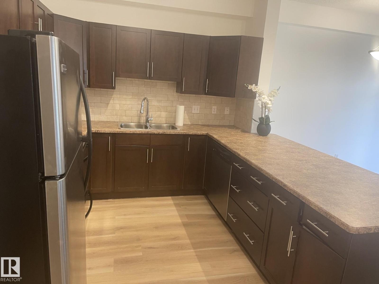 Property at #105 2035 GRANTHAM COURT NW image 2