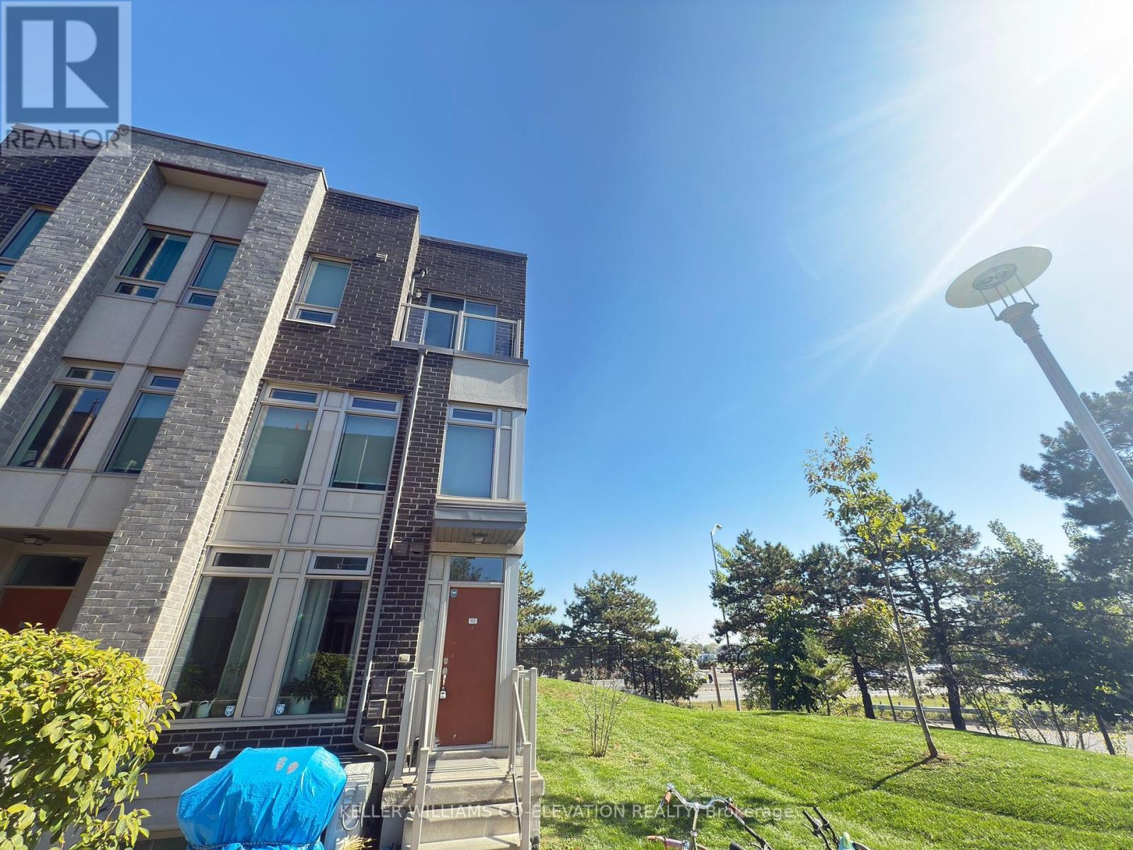 112 - 11 Applewood Lane, Toronto, Ontario  M9C 2Z7 - Photo 2 - W12328631