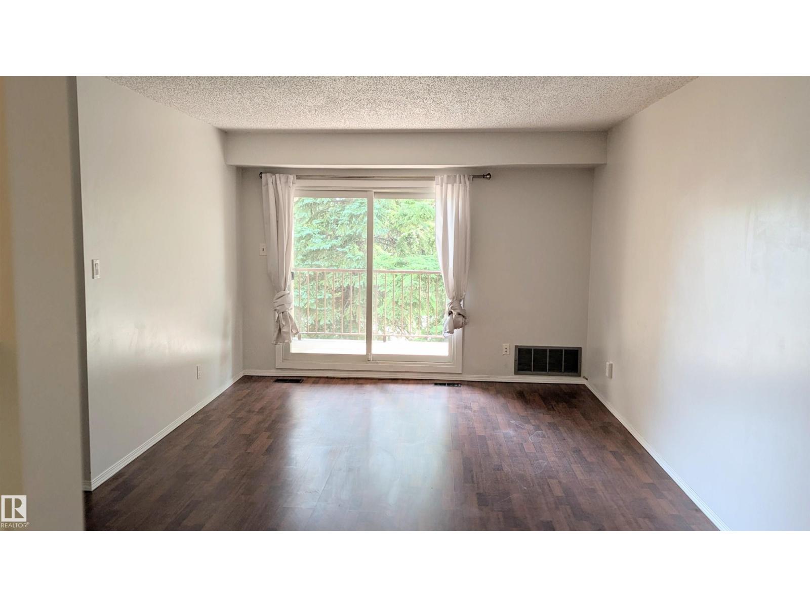 Property at #202 14004 26 st NW NW image 5
