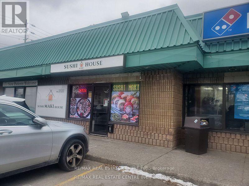 4 - 645 Lakeshore Road E, Mississauga, Ontario  L5G 1J5 - Photo 1 - W12329534