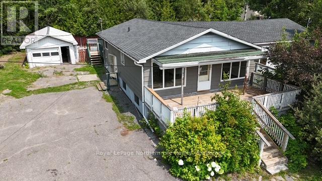 24-26 Spruce Drive, Temagami, Ontario  P0H 2H0 - Photo 3 - X12329825