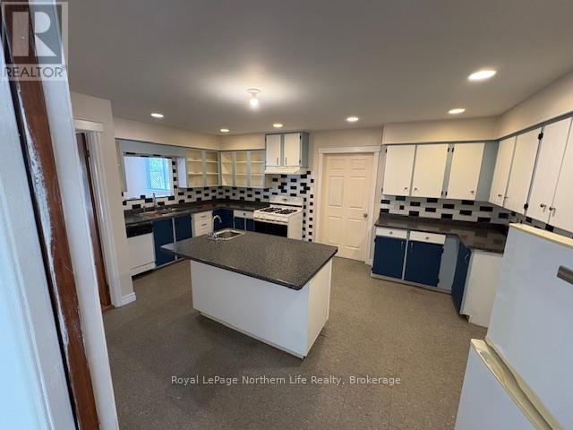 24-26 Spruce Drive, Temagami, Ontario P0H 2H0 - Photo 13 - X12329982