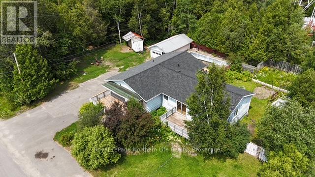 24-26 Spruce Drive, Temagami, Ontario P0H 2H0 - Photo 2 - X12329982