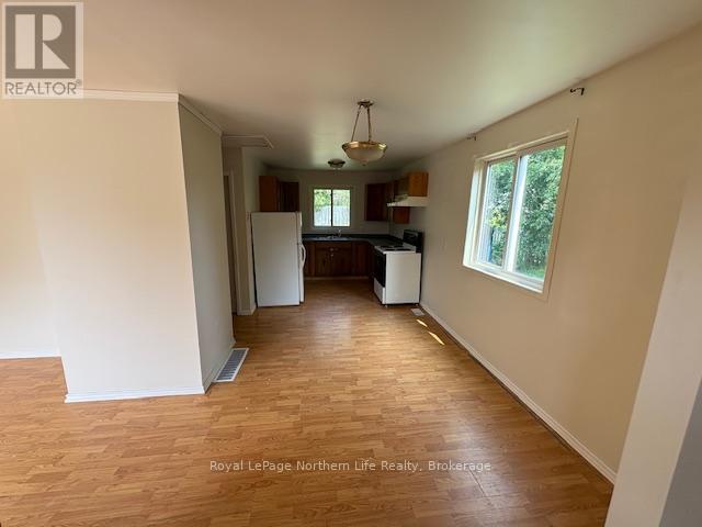 24-26 Spruce Drive, Temagami, Ontario P0H 2H0 - Photo 5 - X12329982