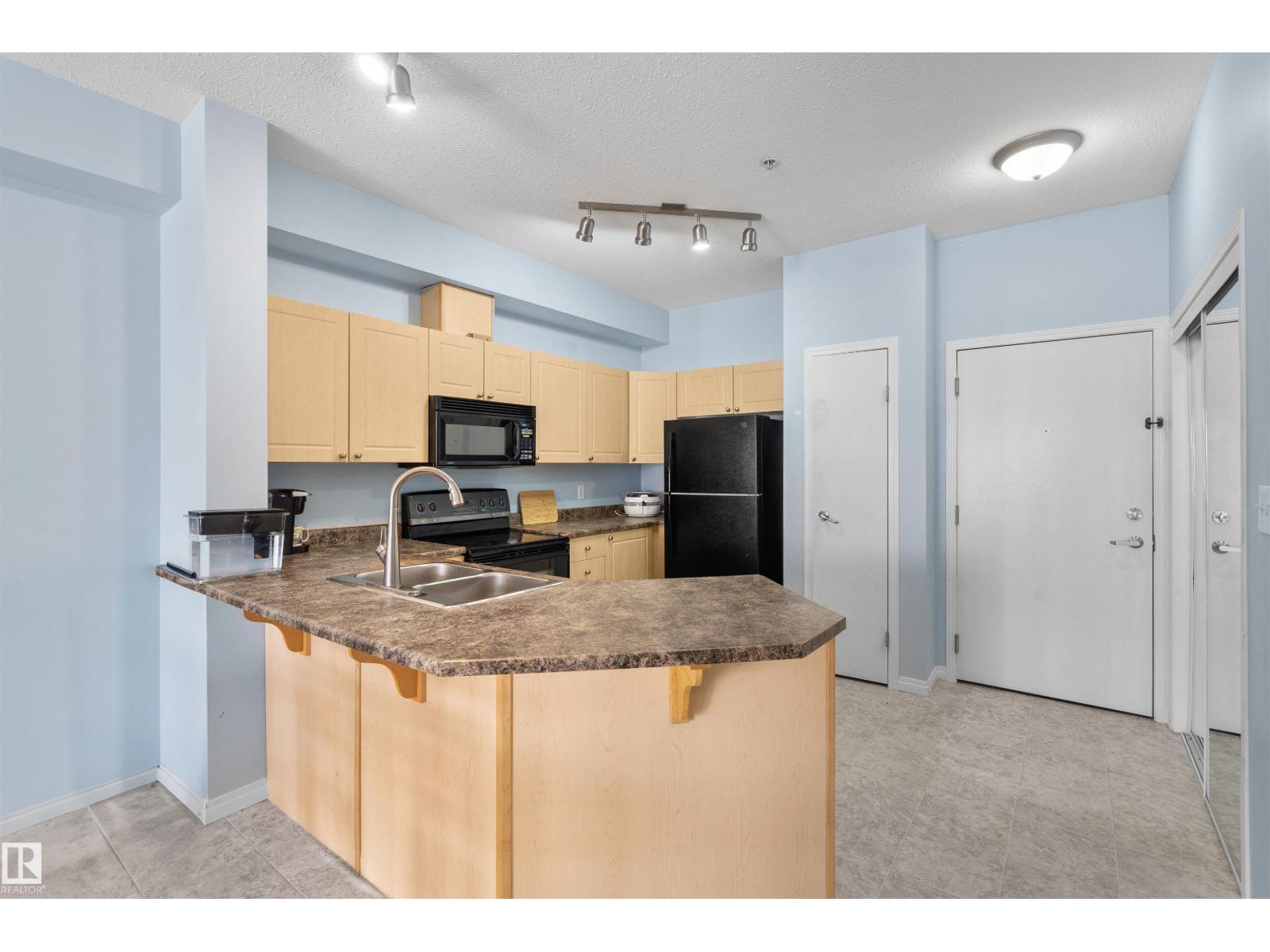 Property at #225 4304 139 AV NW image 4