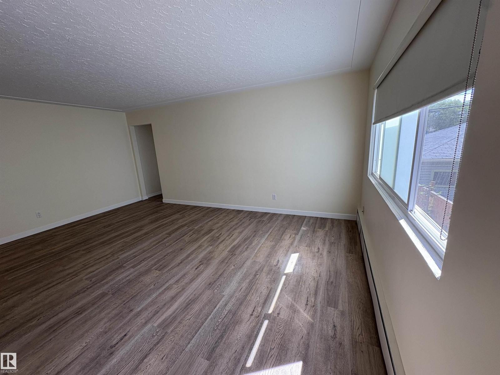 Property at #6 10625 107 AV NW image 4