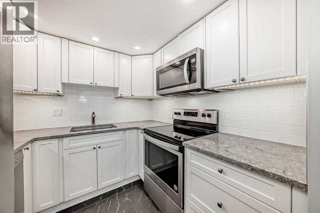 201, 3727 42 Street Nw, Calgary, Alberta  T3A 2M8 - Photo 4 - A2246384