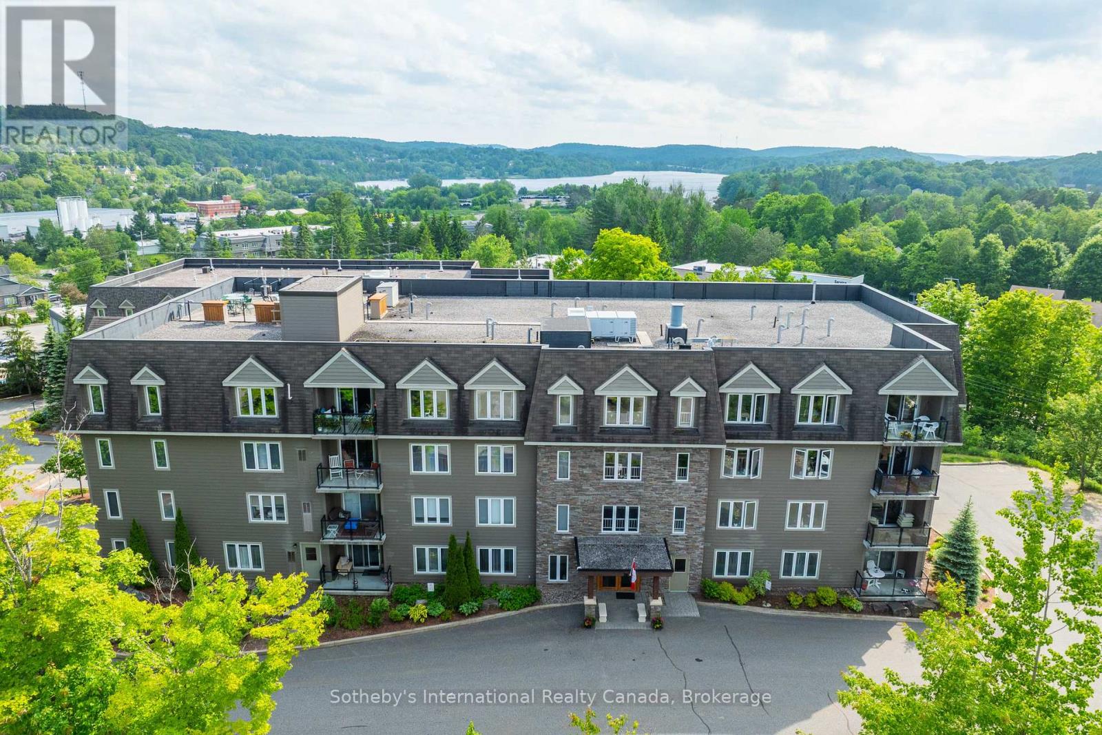 303 - 26 Dairy Lane, Huntsville, Ontario  P1H 0A4 - Photo 2 - X12224626