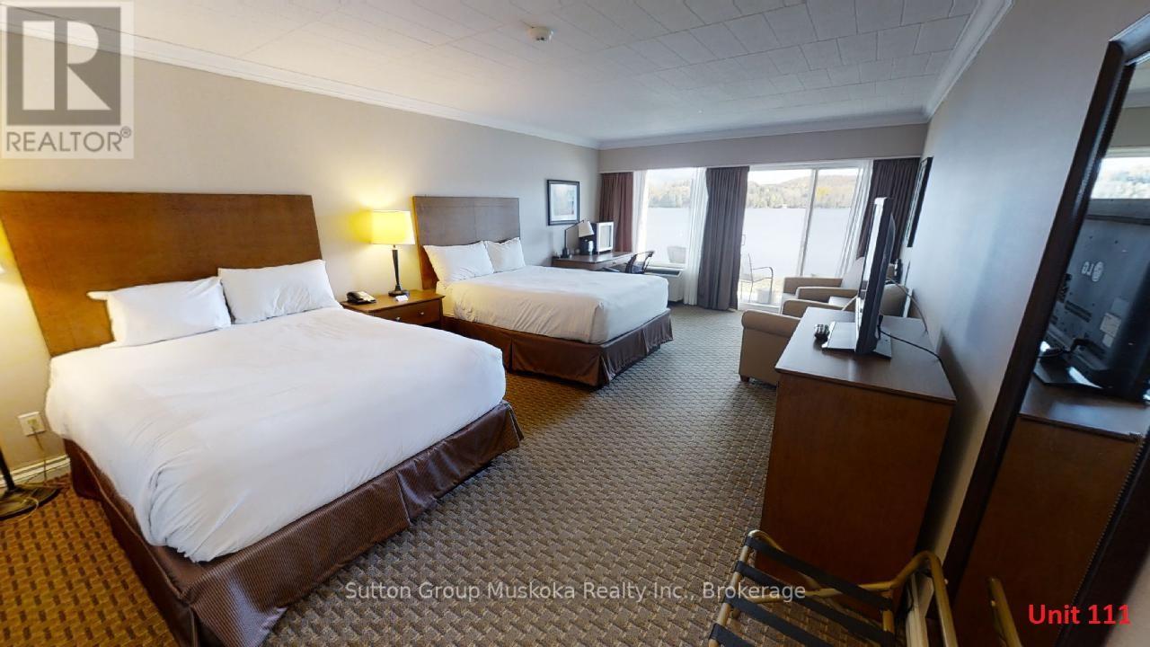 Unit 111 - 1235 Deerhurst Drive, Huntsville, Ontario  P1H 2E8 - Photo 1 - X12298283