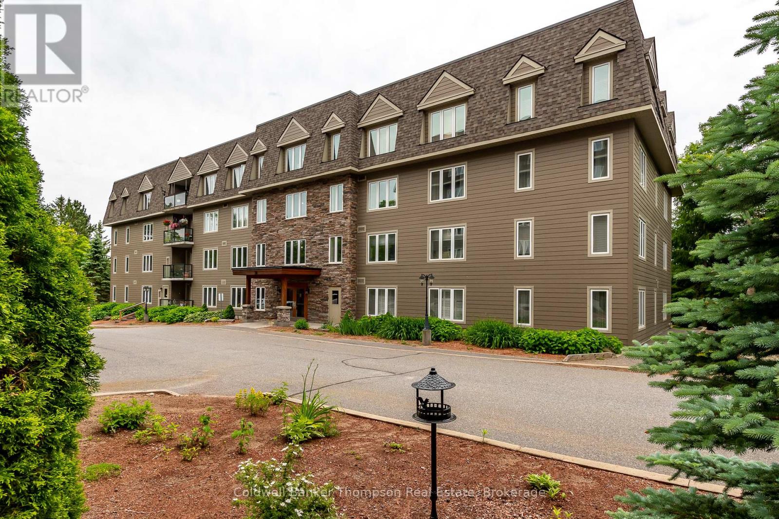101 - 24 Dairy Lane, Huntsville, Ontario  P1H 0A4 - Photo 1 - X12332483